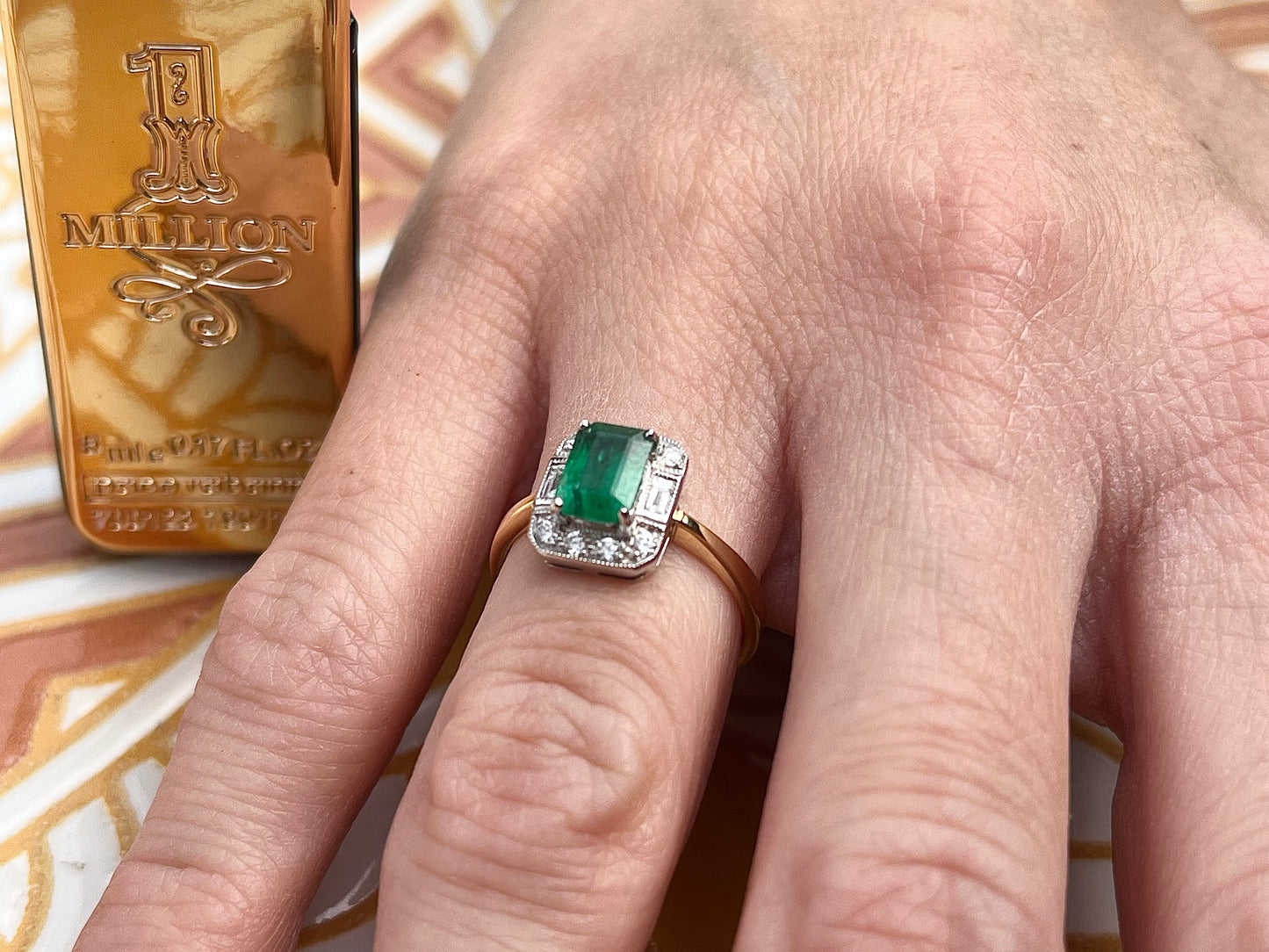 18ct Emerald and diamond ring.