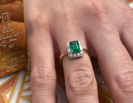 18ct Emerald and diamond ring.