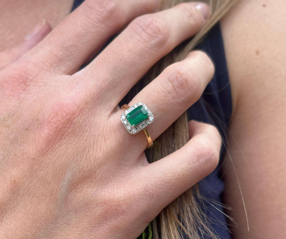18ct Emerald and diamond ring.